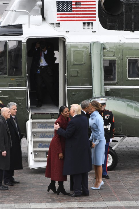 FILE -  Former US president Barack Obama (2-R) and Michelle Obama (L) bid farewll to President Donald Trump (2-L) and Melania Trump (R), in front of Marine One on the East front as Obama departs from the 2017 Presidential Inauguration at the US Capitol, in Washington, DC, USA, 20 January 2017. EPA