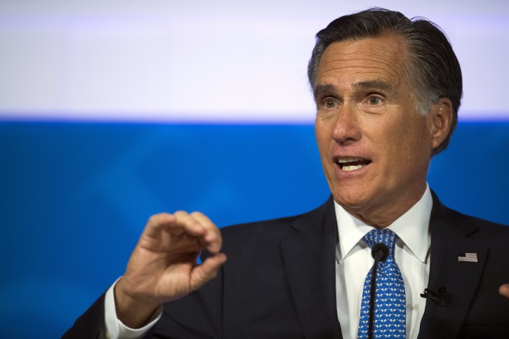 FILE - This Oct. 9, 2018, file photo shows Republican U.S. Senate candidate Mitt Romney answering a question about tariffs during the debate with Democratic opponent Jenny Wilson in the America First Event Center in Cedar City, Utah. Utah Sen.-elect Romney says President Donald Trump's "conduct over the past two years ... is evidence that the president has not risen to the mantle of the office." (James M. Dobson/The Spectrum via AP, File)