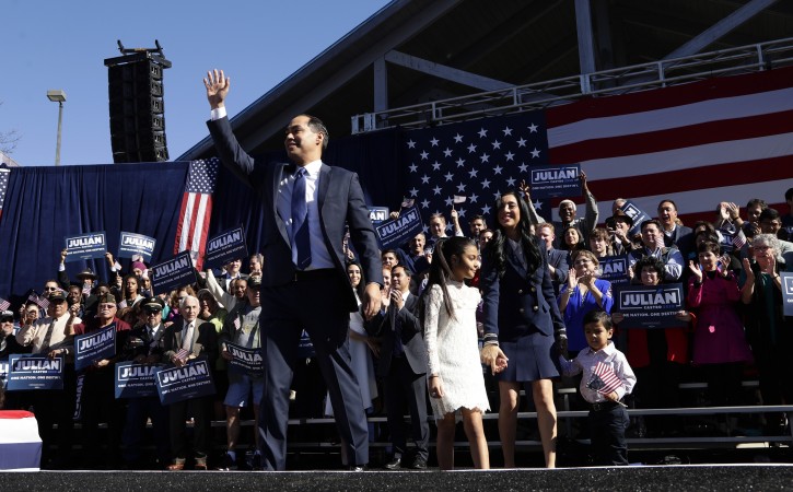 Former San Antonio Mayor and Housing and Urban Development Secretary Julian Castro, front left, waves as he arrives with his family to an event where he announced his decision to seek the 2020 Democratic presidential nomination, Saturday, Jan. 12, 2019, in San Antonio. (AP Photo/Eric Gay)
