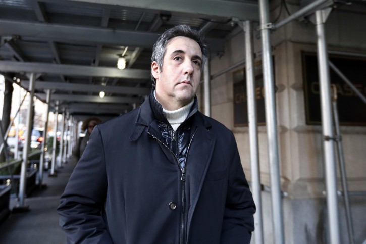 FILE - In this Dec. 7, 2018 file photo, Michael Cohen, former lawyer to President Donald Trump, leaves his apartment building in New York. A report by BuzzFeed News, citing two unnamed law enforcement officials, says that Trump directed Cohen to lie to Congress and that Cohen regularly briefed Trump on the project. The Associated Press has not independently confirmed the report. (AP Photo/Richard Drew, File)