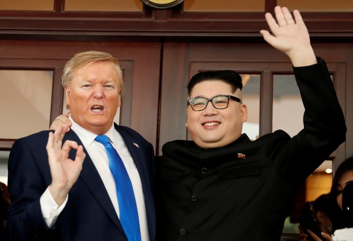 Howard X, an Australian-Chinese impersonator of North Korean leader Kim Jong Un and Russell White, who is impersonating U.S. President Donald Trump, pose for a photo at Metropole Hotel, ahead of the upcoming Trump-Kim summit in Hanoi, Vietnam, February 22, 2019. REUTERS/Jorge Silva