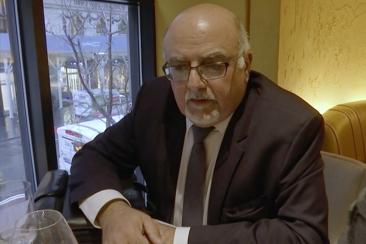 In this image from video, a man identified as former Israeli intelligence officer Aharon Almog-Assouline speaks during an interview at a restaurant in New York on Thursday, Jan. 24, 2019. (AP Photo/Joseph Frederick)