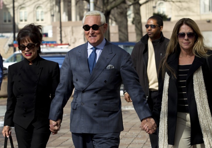 Former campaign adviser for President Donald Trump, Roger Stone accompanied by his wife Nydia Stone, left, and daughter Adria Stone, arrives at federal court in Washington, Thursday, Feb. 21, 2019. Stone was ordered to appear in court over a Instagram post he made about U.S. Judge Amy Berman Jackson. (AP Photo/Jose Luis Magana)