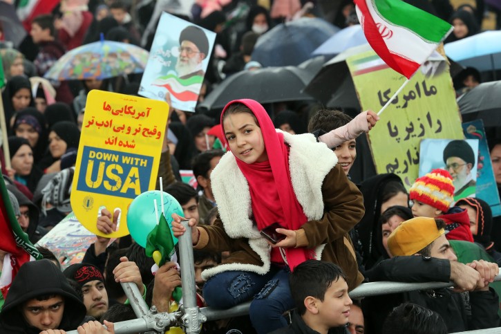 Iranians carry anti-US and anti-Israel banners and placards as they take part in a ceremony marking the 40th anniversary of the 1979 Islamic Revolution, at the Azadi (Freedom) square in Tehran, Iran, 11 February 2019.