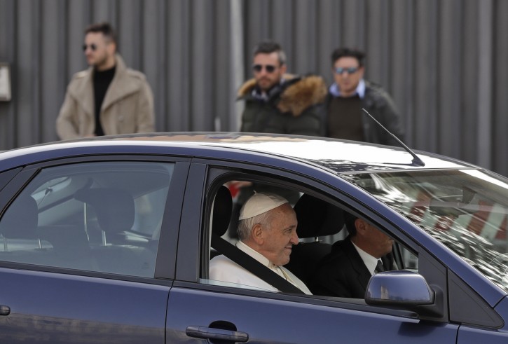 Pope Francis leaves St. John Basilica after a meeting with Roman clergy, Thursday, March 7, 2019. (AP Photo/Alessandra Tarantino)