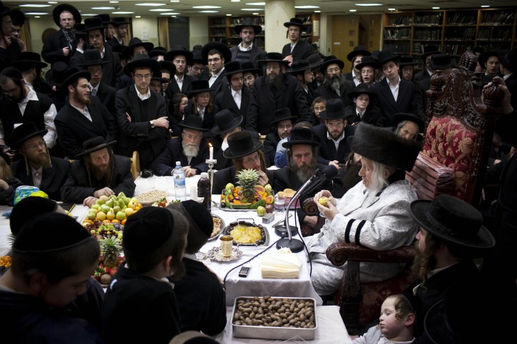 Ultra-Orthodox Jews of the Kaliv Hasidic dynasty celebrate the Jewish feast of 'Tu Bishvat' or Tree New Year as they sit with their rabbis around a long table filled with all kinds of fruits, in a ultra-Orthodox neighborhood in Jerusalem, Israel, 07 February 2012. Photo By Yonatan Sindel/Flash90