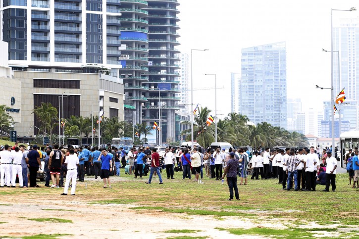 Hotel staffs and guests gather in the open after an explosion hit Shangri-La Hotel  in Colombo, Sri Lanka, 21 April 2019. EPA
