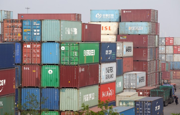 Containers are seen at a logistics center near Tianjin Port, in northern China, May 16, 2019. REUTERS/Jason Lee