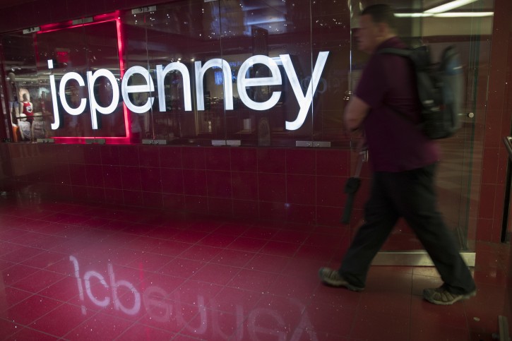 FILE - In this May 16, 2018 file photo, a man enters the JC Penney store at the Manhattan mall in New York. J.C. J.C. Penney Co. (JCP) on Tuesday, May 21, 2019. reported a loss of $154 million in its fiscal first quarter.  (AP Photo/Mary Altaffer, File)