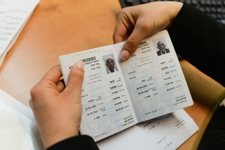 FILE - Members of the Falashmura community receive their documents after arriving to the Immigration offices at the Ben Gurion airport, outside Tel Aviv on February 4, 2019. Photo by Tomer Neuberg/Flash90