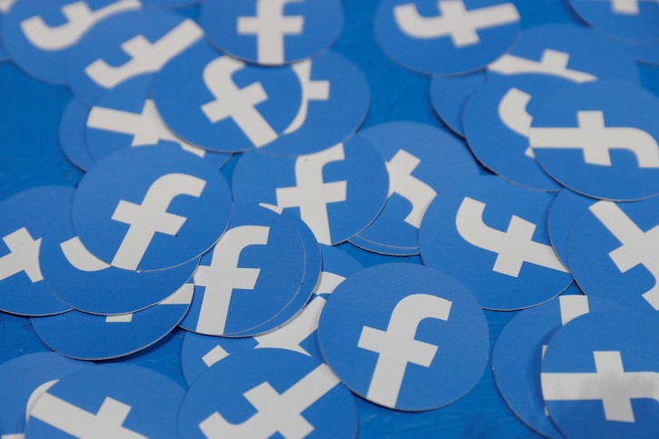 FILE - Stickers bearing the Facebook logo are pictured at Facebook Inc's F8 developers conference in San Jose, California, U.S., April 30, 2019. REUTERS/Stephen Lam/File Photo
