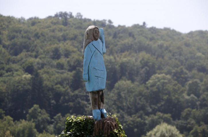 In this Friday, July 5, 2019 photo, a sculpture created by American artist Brad Downey depicting Melania Trump is seen in her hometown in Sevnica, Slovenia. A life-size sculpture of the U.S. first lady has been unveiled in her hometown of Sevnica, drawing mixed reactions from the locals. (AP Photo/Miro Majcen)