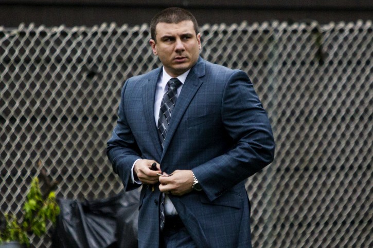 NYPD officer Daniel Pantaleo leaves his house before showing up to court during his trial for Eric Garner dead, Monday, May 13, 2019 in Staten Island, New York. (AP Photo/Eduardo Munoz Alvarez)