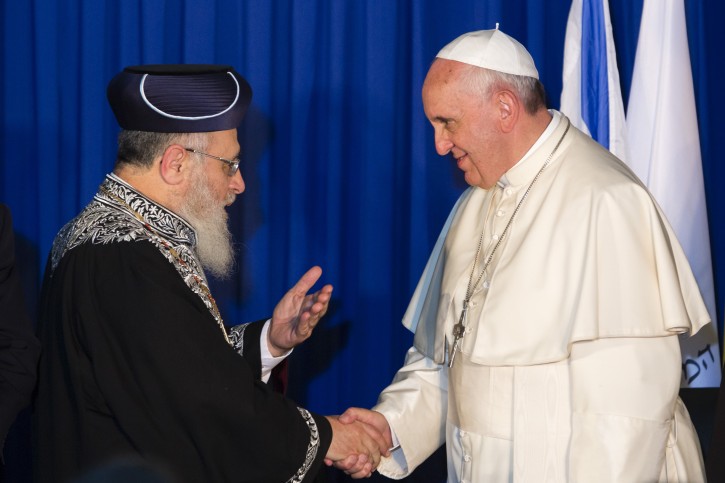 FILE - Pope Francis seen with Sephardi Chief Rabbi Yitzhak Yosef  (L), as the Pope meets with the Israeli Chief rabbis  in "Heichal Shlomo", the former seat of the chief Rabbinate of Israel, adjacent to the Great Synagogue in Jerusalem on May 26, 2014. Flash90