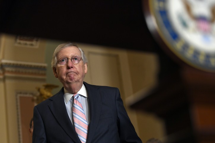 Senate Majority Leader Mitch McConnell of Ky., walks out to speaks to reporters following the weekly policy lunches on Capitol Hill in Washington, Tuesday, July 23, 2019. (AP)